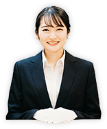 白手袋をしたスーツ女性
